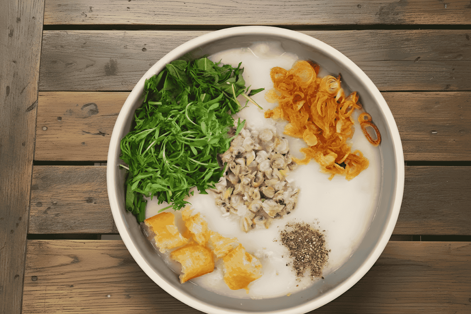 Cách nấu cháo hến nấm rơm rau đắng đậm đà hương quê