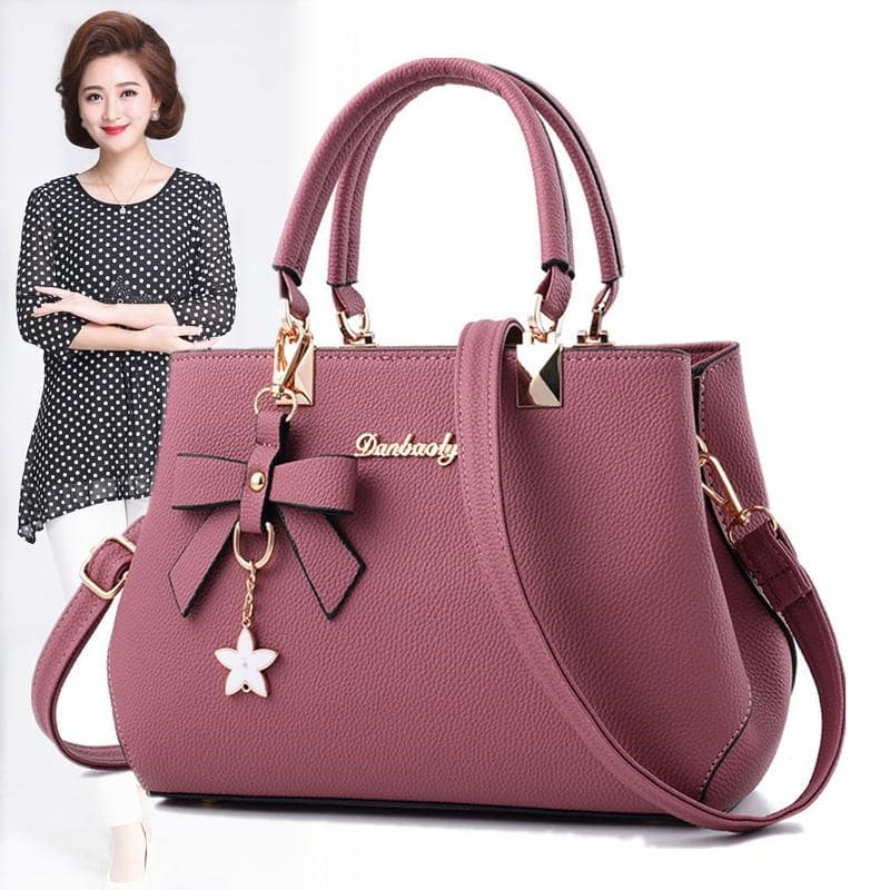 Túi xách da thời trang giúp mẹ thêm quý phái khi diện áo dài du xuân