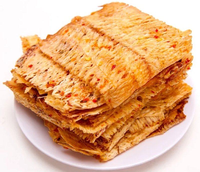 Mực tẩm gia vị dai ngon và rất bắt miệng khi dùng làm món ăn nhẹ