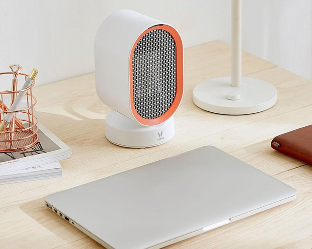 Sử dụng máy sưởi mini để giữ ấm cơ thể